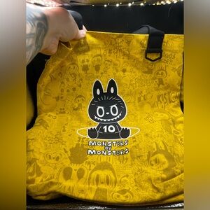 Yellow Monsters by Monsters 10th Anniversary Tote Bag